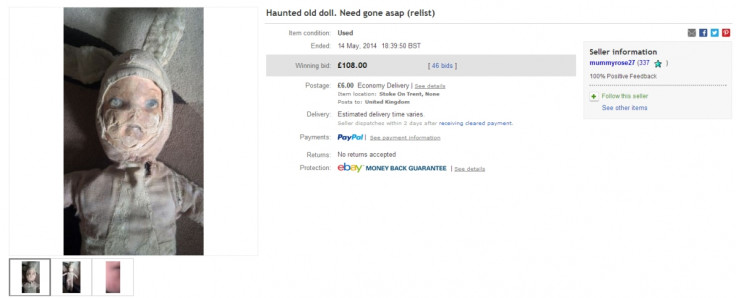 A haunted old doll that has sold on eBay for £108 with 46 bids