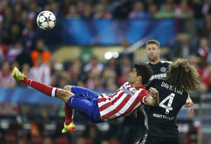 Atletico Madrid's Diego Costa lines up an overhead kick next to Chelsea's David Luiz during their Champion's League semi-final first leg soccer match at Vicente Calderon stadium in Madrid, April 22, 2014.