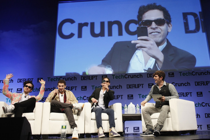 Mahbod Moghadam (centre with phone) lords it up at a TechCrunch event, last year