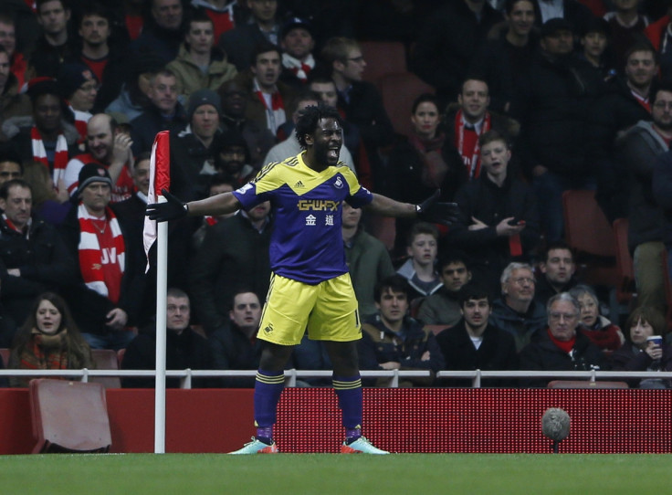 Swansea City's Wilfried Bony celebrates after scoring during their English Premier League soccer match against Arsenal at the Emirates stadium in London March 25, 2014.