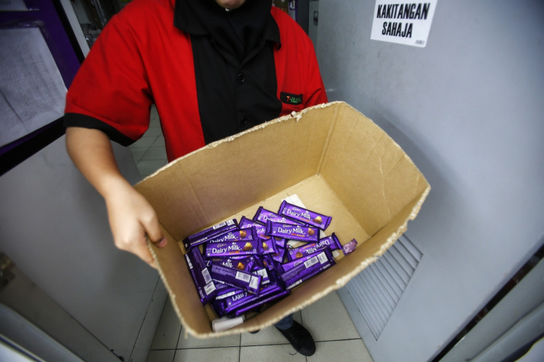 a box containing Cadbury Dairy Milk Hazelnut and Cadbury Dairy Milk Roast Almon