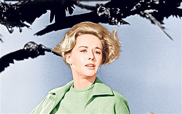 Eerie Portent? Crows swarm around Tippi Hedren in scene from The Birds, by Alfred Hitchcock Eerie Portent? Crows swarm around Tippi Hedren in scene from The Birds, by Alfred Hitchcock