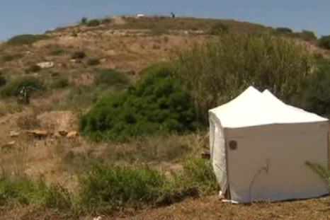 Police erect tent on scrub land in the search for Madeleine McCann