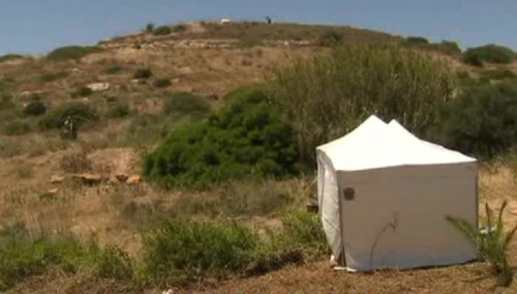 Police erect tent on scrub land in the search for Madeleine McCann