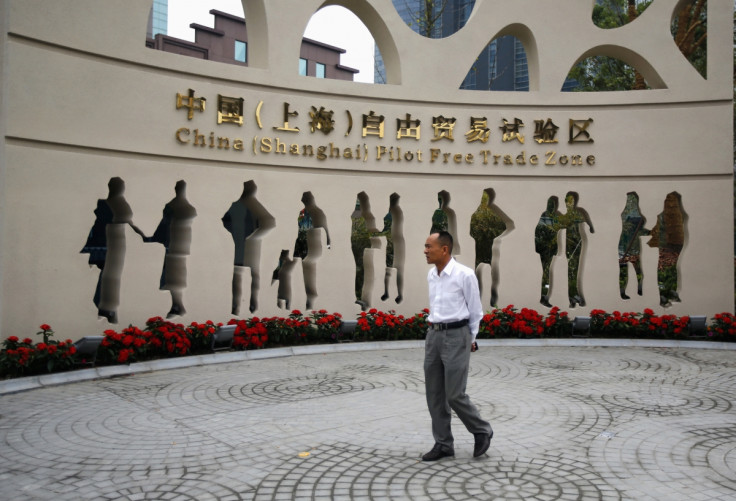 A man walks at the entrance of the new Shanghai Free Trade Zone in Pudong district, Shanghai