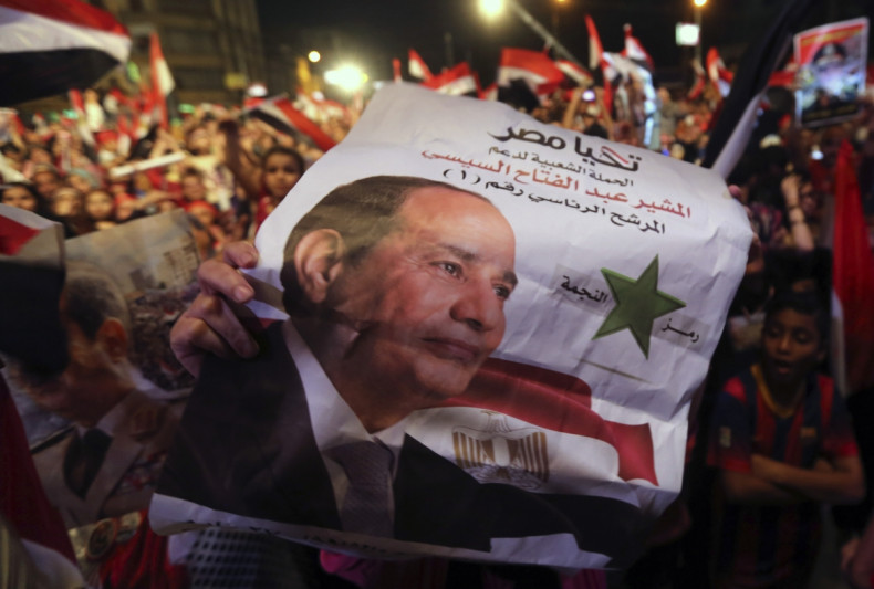 Egyptians gather outside the presidential palace to celebrate former Egyptian army chief Abdel Fattah al-Sisi's victory in the presidential vote in Cairo