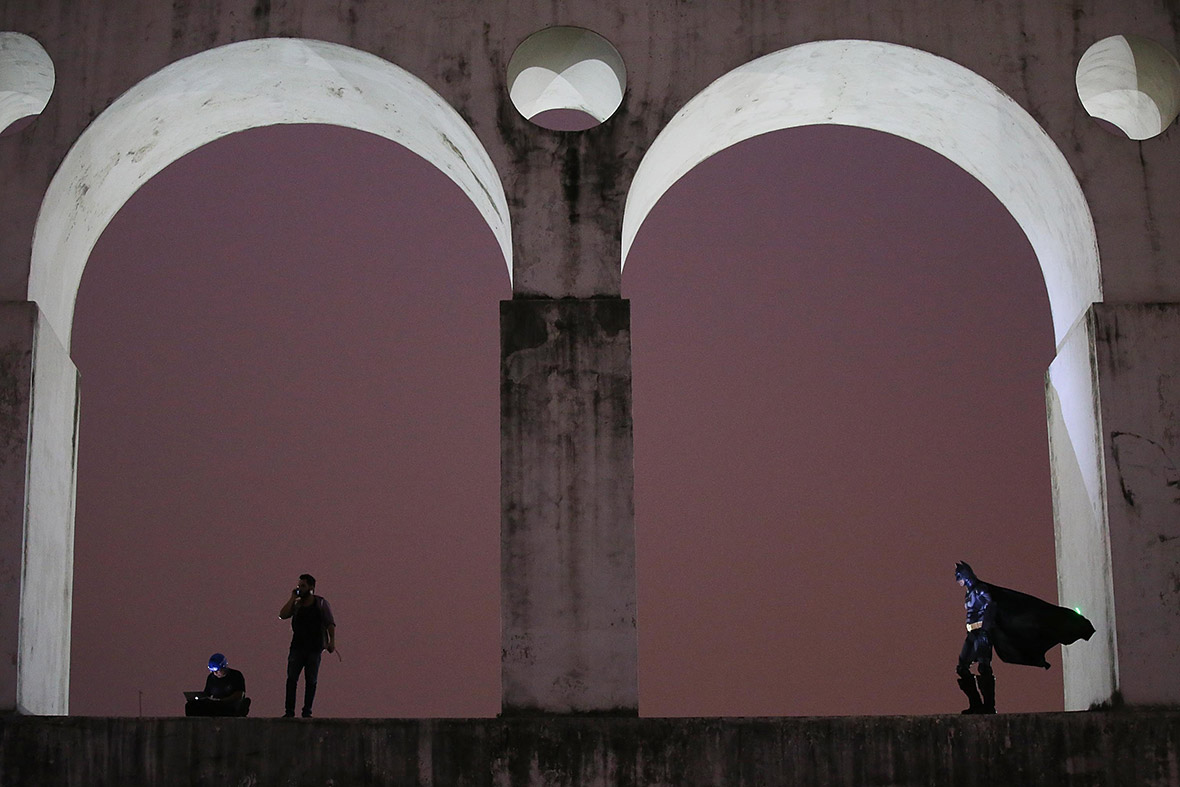 Batman watches over Rio from the Carioca Aqueduct on October 31, 2013