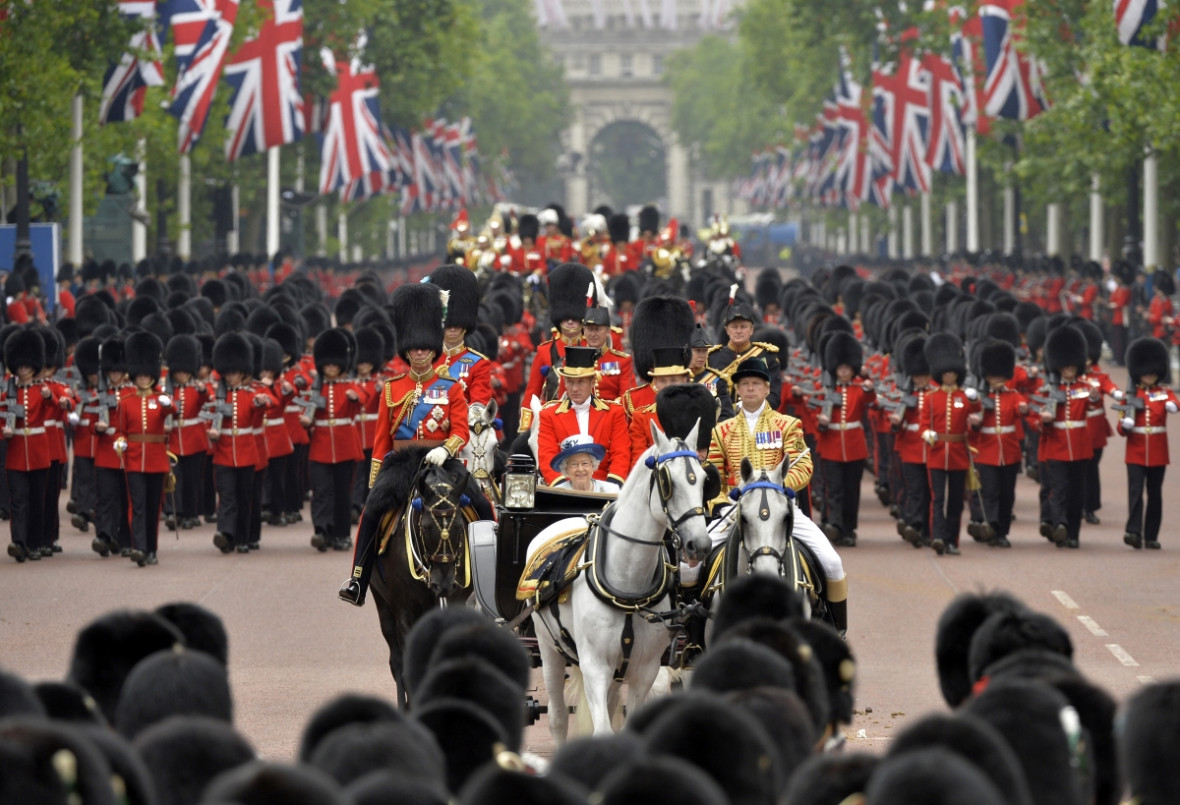 The Queen rides down The Mall as she returns to Buckingham Palace in the annual Trooping the Colour ceremony The Queen rides down The Mall as she returns to Buckingham Palace in the annual Trooping the Colour ceremony