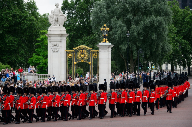 Members of the Queens Guard march past Buckingham Palace ahead of Trooping the Colour (Getty)