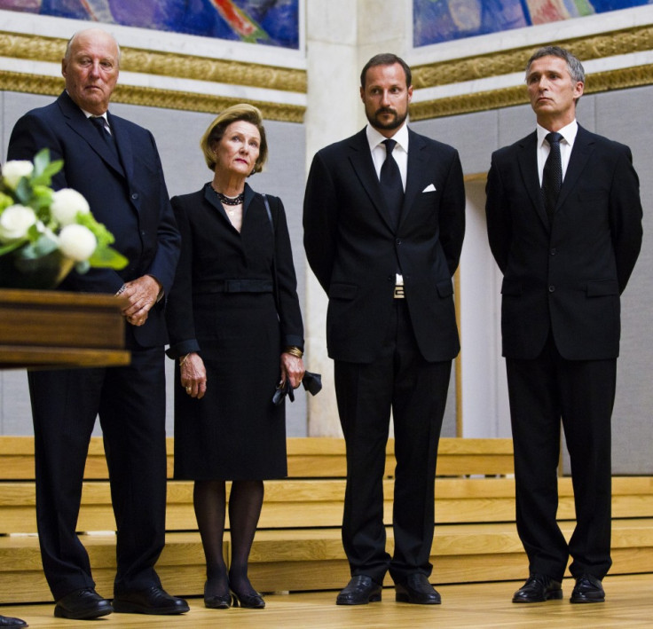 Norway's King Harald, Queen Sonja, Crown Prince Haakon and PM Stoltenberg attend ceremony to sign a protocol of condolence in Grand Hall of Oslo University