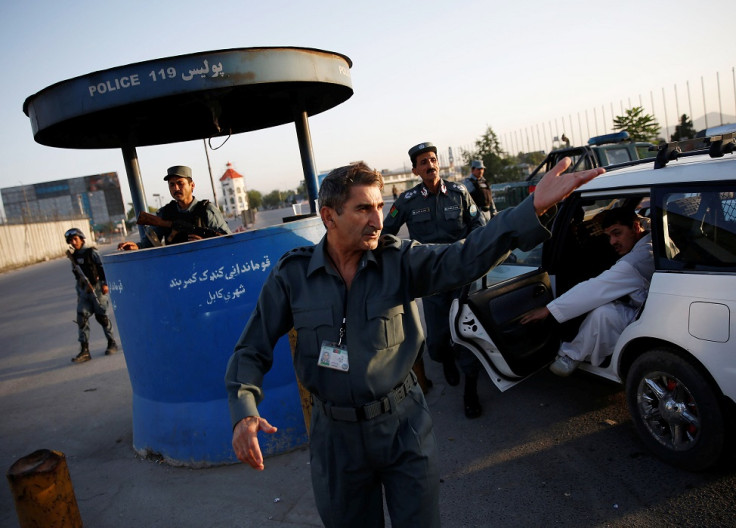 Police manning a security checkpoint in Kabul