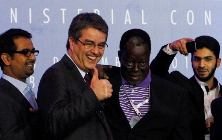 Director-General Roberto Azevedo gives a thumbs-up as he greets delegates after the closing ceremony of the ninth World Trade Organization (WTO) Ministerial Conference in Nusa Dua, on the Indonesian resort island of Bali, on 7 December, 2013 (Reuters).