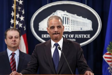 U.S. Attorney General Eric Holder speaks at a news conference at the Justice Department in Washington
