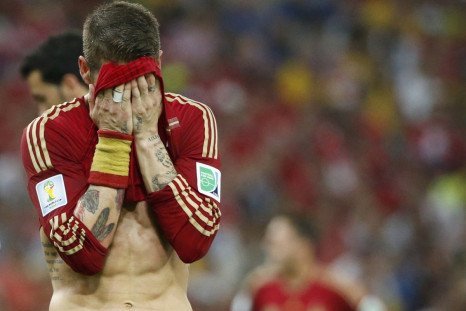 Spain's Sergio Ramos reacts during their 2014 World Cup Group B soccer match against Chile at the Maracana stadium in Rio de Janeiro June 18, 2014