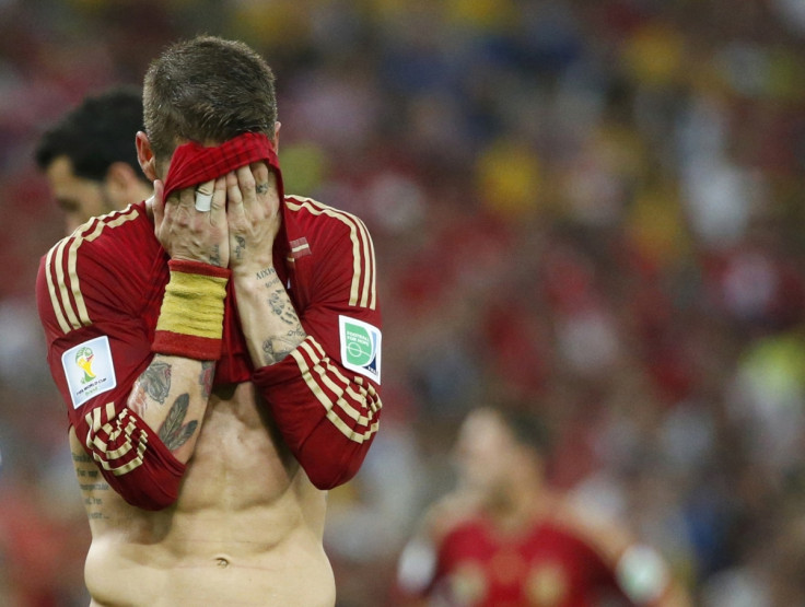Spain's Sergio Ramos reacts during their 2014 World Cup Group B soccer match against Chile at the Maracana stadium in Rio de Janeiro June 18, 2014