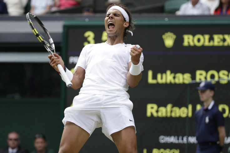 Rafael Nadal of Spain reacts after defeating Lukas Rosol of the Czech Republic