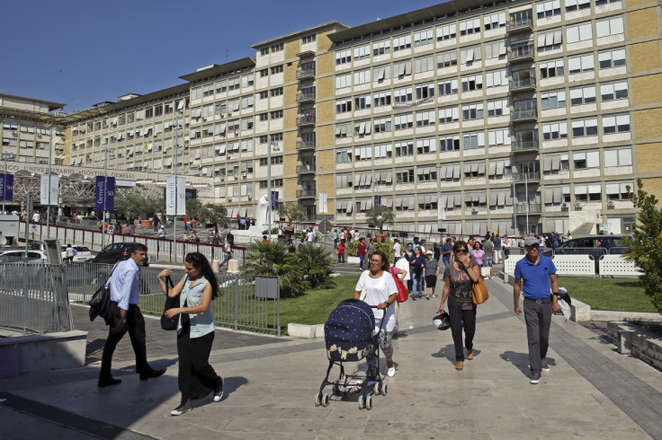 People leave Gemelli hospital after Pope Francis cancelled his visit in Rome