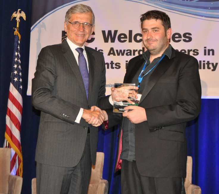 Ian Hamilton Accepting Award from FCC