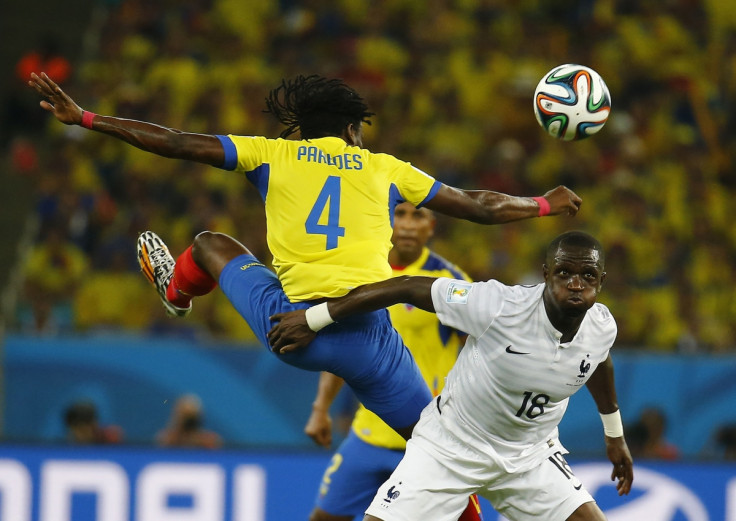 France's Moussa Sissoko (R) is full of puff during the match at the Maracana stadium in Rio de Janeiro