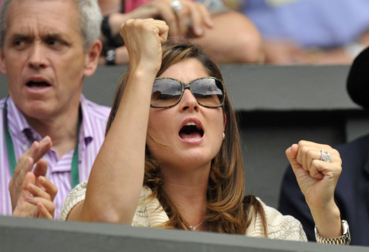 Mirka Vavrinec, reacts on Centre Court during the match between her husband and Colombia's Alejandro Falla