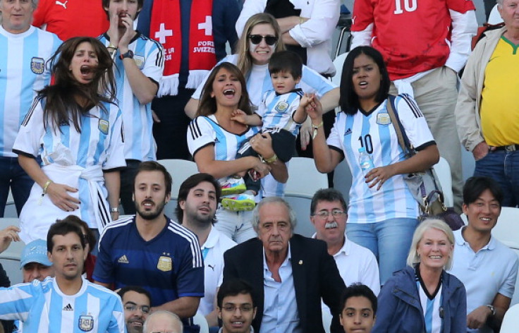 Antonella Roccuzzo, girlfriend of Lionel Messi and their son, Thiago Messi attend the 2014 FIFA World Cup Brazil Round of 16 match between Argentina and Switzerland at Arena de Sao Paulo on July 1, 2014 in Sao Paulo, Brazil