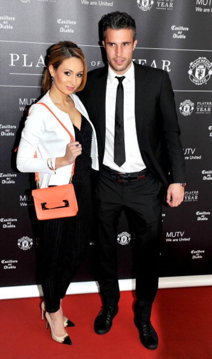 Robin Van Persie and Bouchra Van Persie attend the Manchester United Player of the Year awards at Old Trafford on May 8, 2014 in Manchester.