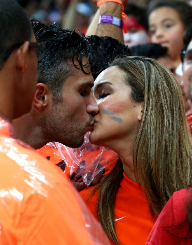 Robin van Persie of the Netherlands kisses his wife Bouchra after the win in the 2014 FIFA World Cup Brazil Quarter Final match between Netherlands and Costa Rica at Arena Fonte Nova on July 5, 2014 in Salvador, Brazil
