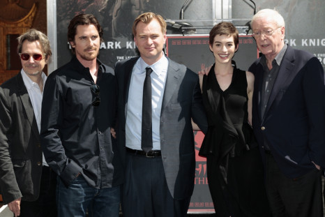 Director Christopher Nolan (C) poses with actors (from L-R) Gary Oldman, Christian Bale, Anne Hathaway and Michael Caine
