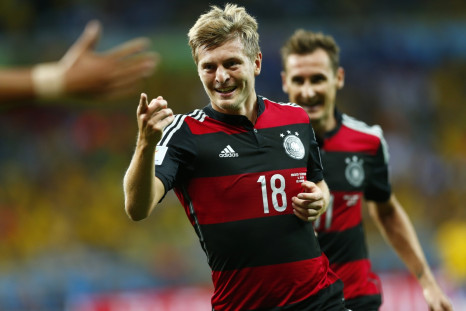 Germany's Toni Kroos celebrates after scoring his second goal during the 2014 World Cup semi-finals against Brazil
