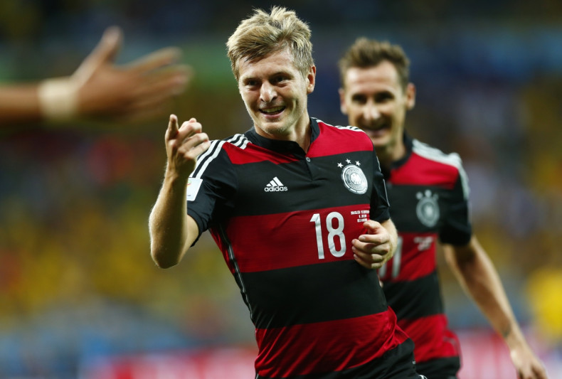 Germany's Toni Kroos celebrates after scoring his second goal during the 2014 World Cup semi-finals against Brazil