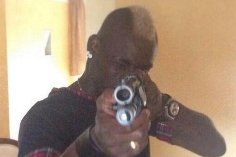 Mario Balotelli poses with shotgun in banned Instagram picture in which he took aim at 'haters'