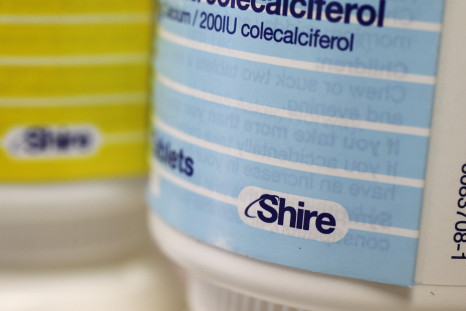 Vitamins made by Shire are displayed at a chemist's in northwest London