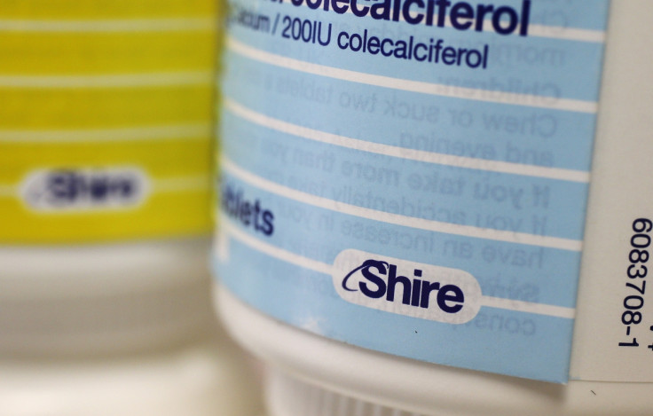 Vitamins made by Shire are displayed at a chemist's in northwest London