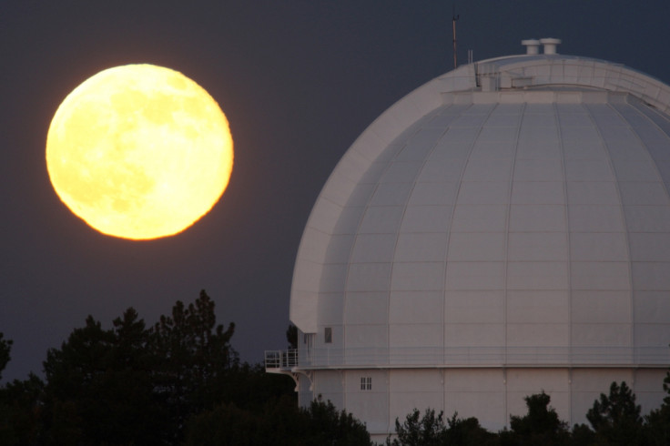 The supermoon, or perigee moon, rises behind the Mount Wilson Observatory at Mount Wilson in the Angeles National Forest