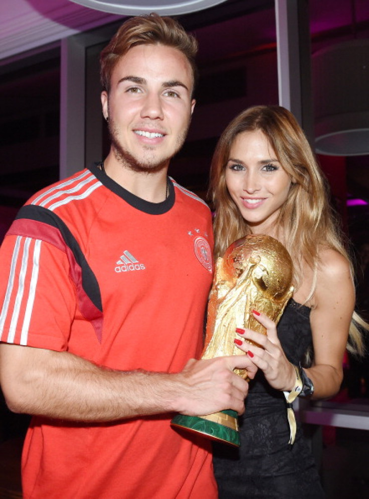 Goalscorer Mario Gotze of Germany and girlfriend Ann-Kathrin Brommel