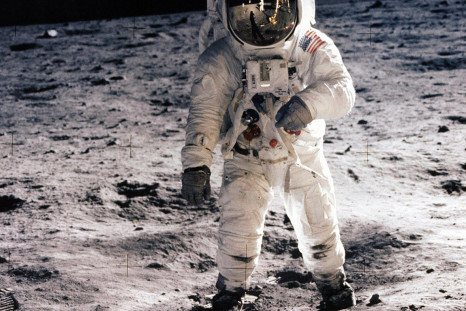 July 20, 1969: Buzz Aldrin walks on the surface of the moon.  Neil  Armstrong, taking the photo,  is reflected in his visor
