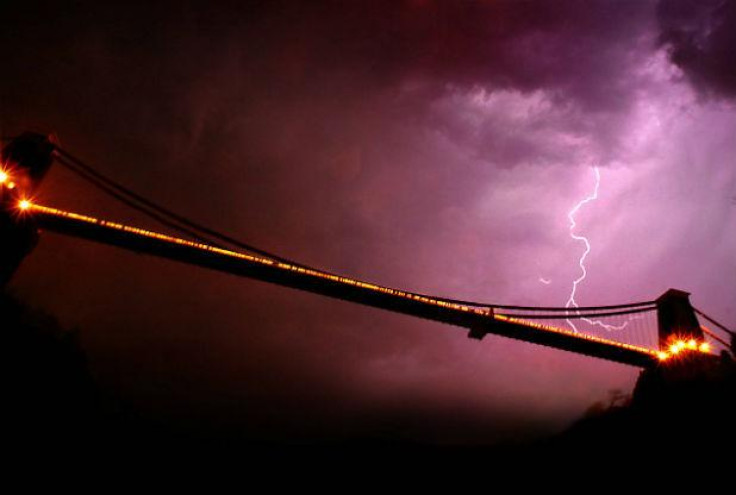 Clifton Suspension Bridge in Bristol is the centre of an electric storm.