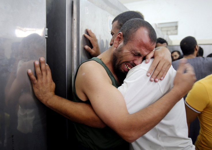 Palestinians mourn the death of their relatives