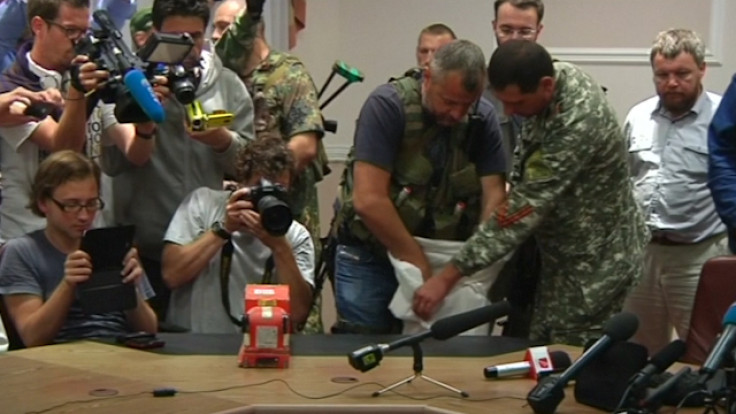 MH17: Ukraine Rebels Hand over Black Boxes to Experts