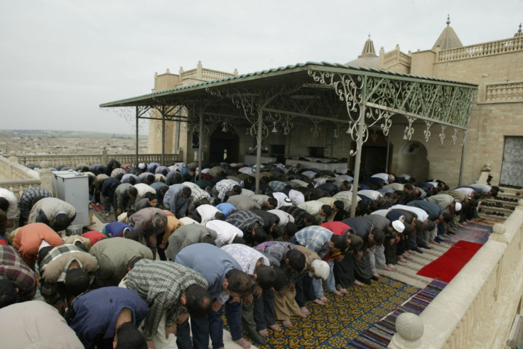 Worshippers at the Mosque of the prophet Yunus in Mosul in 2010. (Getty)