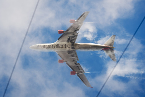A virgin Atlantic flight was forced to make an emergency landing after cocaine pellets burst in a drugs mule's stomach.