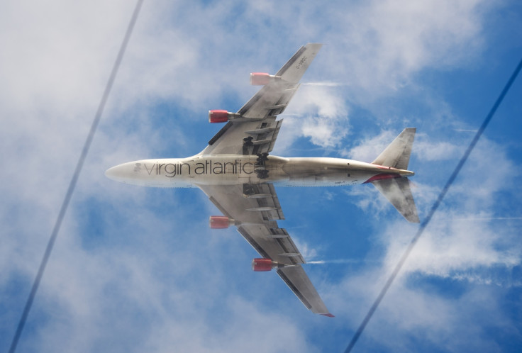 A virgin Atlantic flight was forced to make an emergency landing after cocaine pellets burst in a drugs mule's stomach.