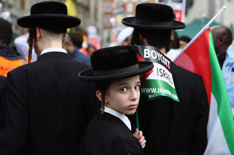 Jewish pro-Palestine demonstrators at a rally in London yesterday. (Getty)