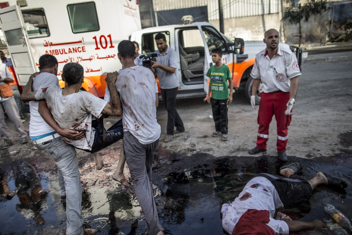Missile strike by Israel on a crowded market in Gaza left many dead an injured Missile strike by Israel on a crowded market in Gaza left many dead an injured