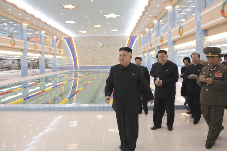 Portly Kim Jong Un opts against making a huge splash in the pool