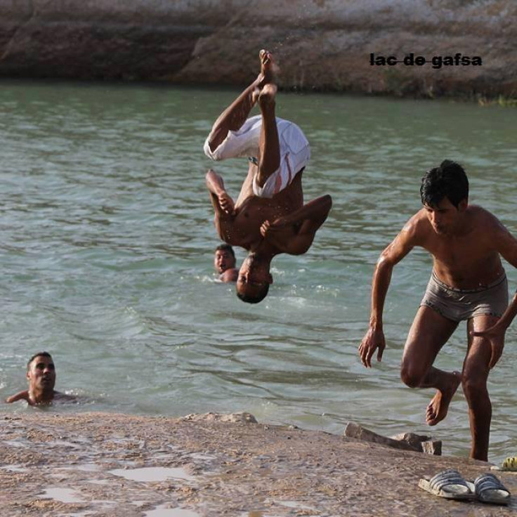 Bathers have ignored warnings of potential health hazards to swim in the waters of Lake Gafsa.