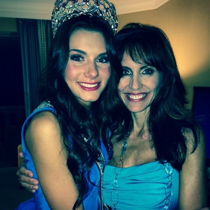 Miss South Carolina K. Lee Graham who was crowned Miss Teen USA 2014, poses with her mother after her pageant.