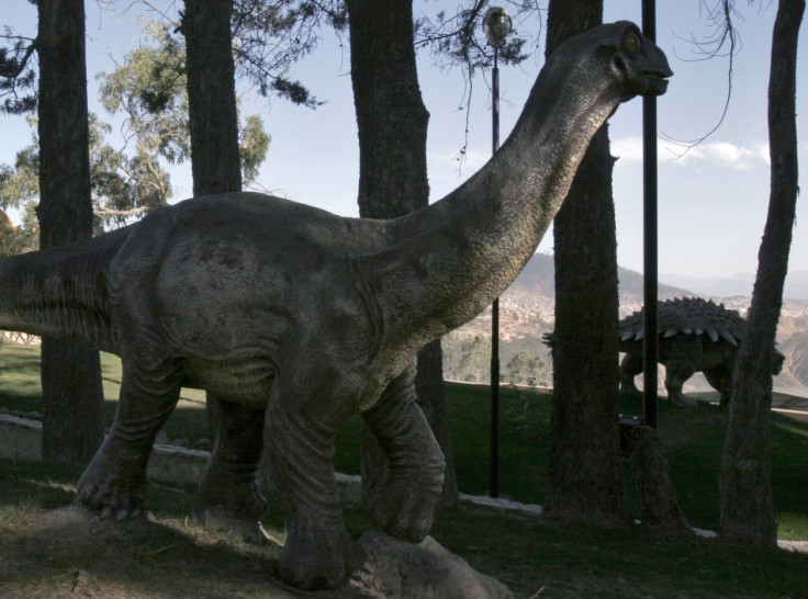 Baby titanosaurus (L) and ankylosaurus