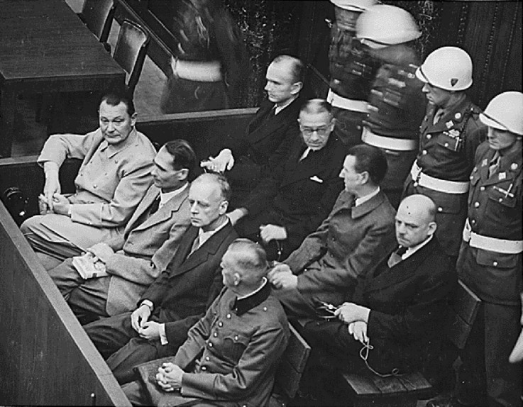 Nazi defendants (L-R front row) Hermann G?ring, Rudolf Hess, Joachim von Ribbentrop and Wilhelm Keitel sit in the dock of their war crimes trial at Nuremberg circa 1945-1946.