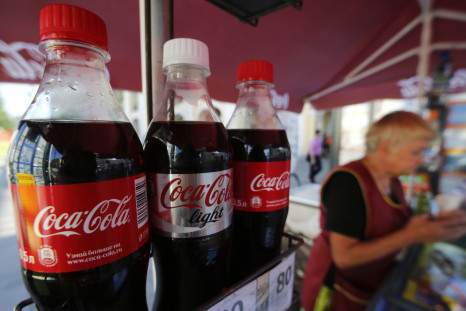 Coca-Cola bottles are seen on sale in central St. Petersburg, August 6, 2014. Coca-Cola Co confirmed on Wednesday it had taken advertisements off four Russian television channels